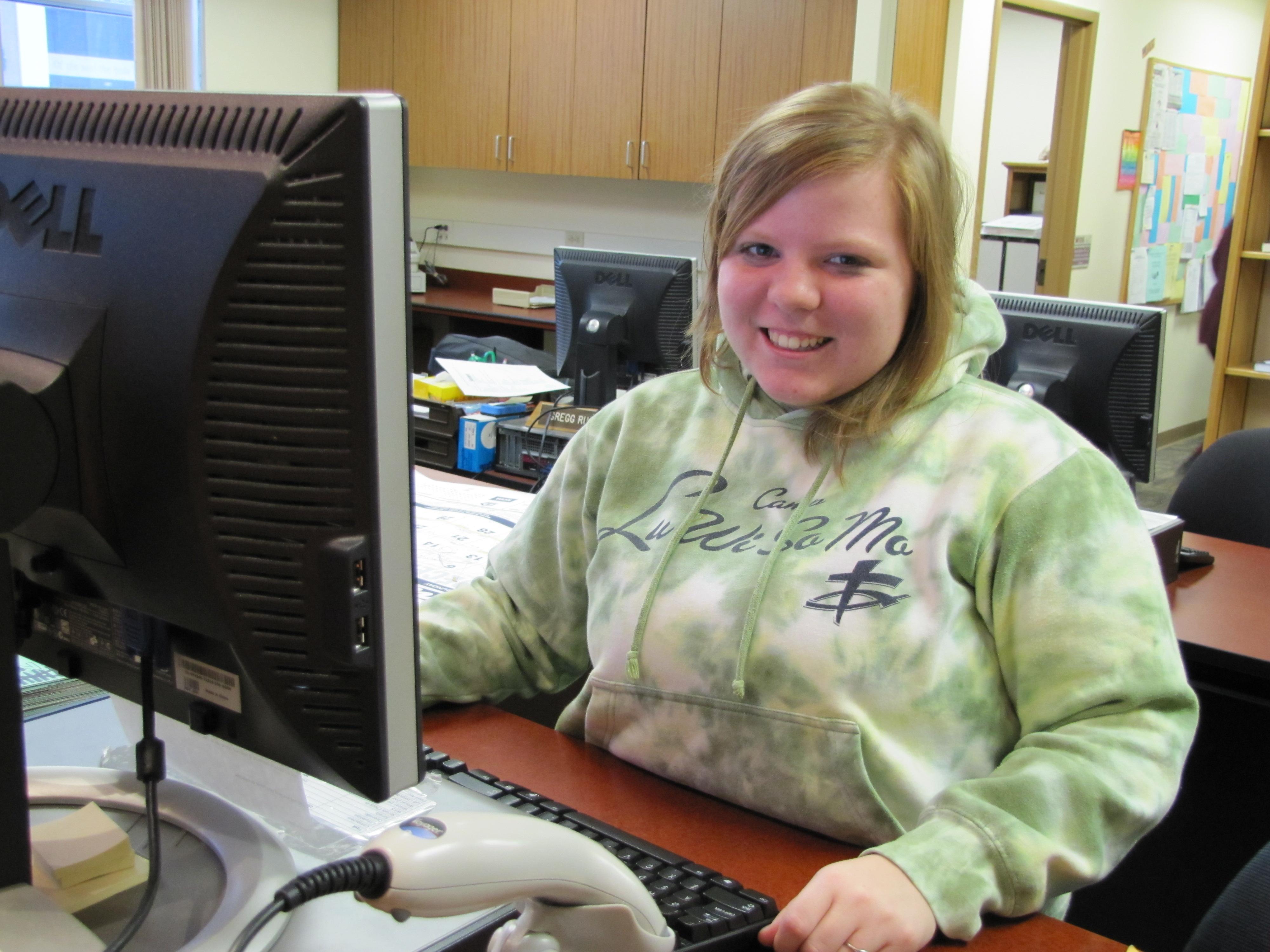 Student worker at the library's Main Desk