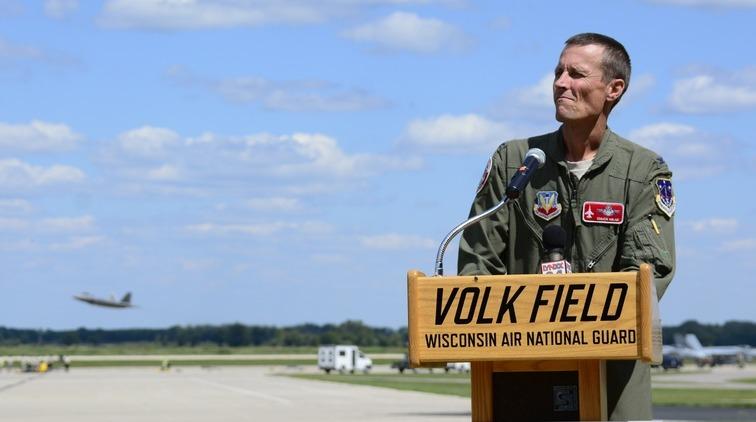 Chad Milne speaks at Volk Field, where he played a major role in creating an upgraded operations center for combat training.