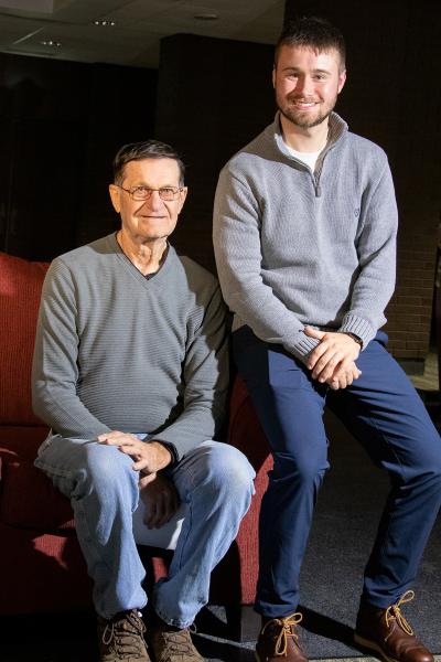 Deak Swanson, who established the Binkowski/Swanson Scholarship to honor his sister, brother, and son, is pictured with nursing major Malaki Wessel, right, at a Viterbo Scholarship Thank You event.