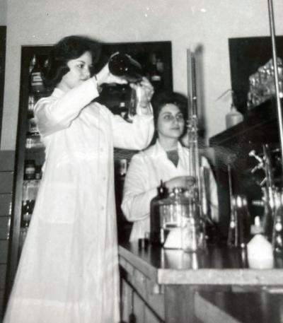 Brueggeman, left, is pictured during a chemistry class as an undergrad at Viterbo.
