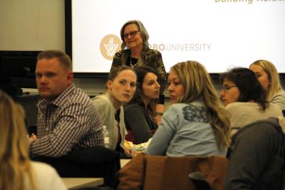 Deb Murray leads the first VOICE Community Conversation, held Feb. 20 at the Viterbo University School of Nursing building.