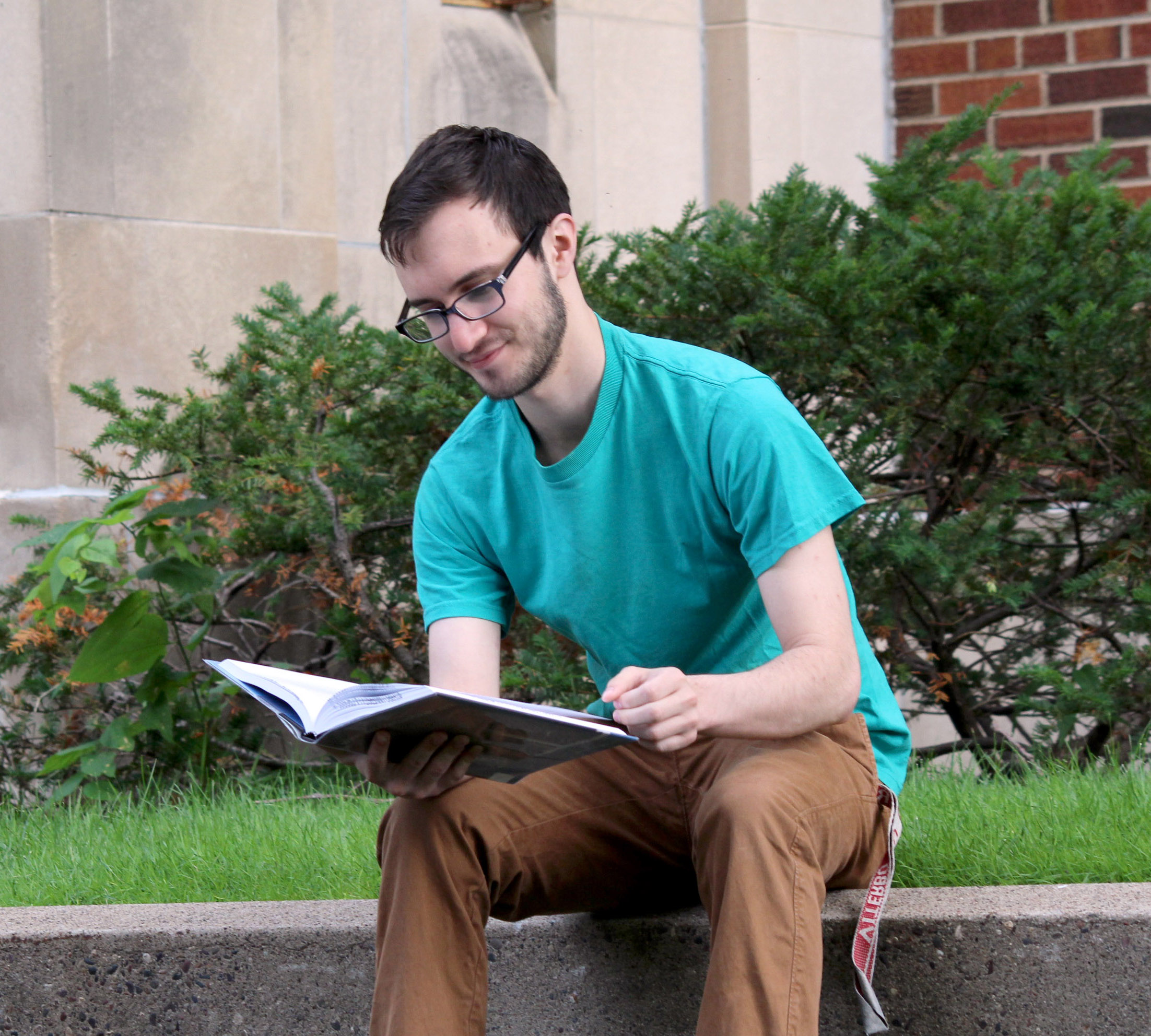 Student reading book