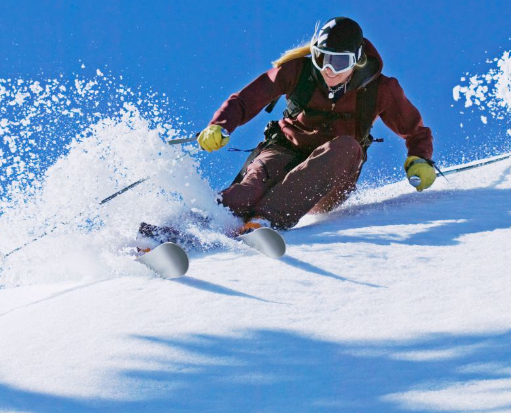 Image of a woman skiing in the snow