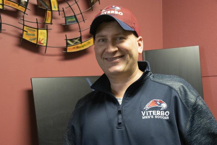 Chad Gilbeck, Viterbo's help desk director, has been dispensing technology assistance with patience and humor for two decades at the university..
