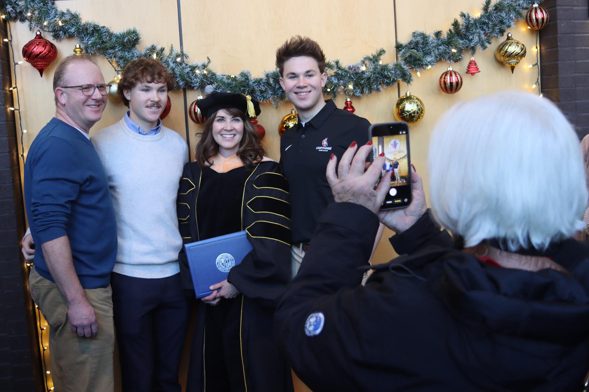 Graduate with family