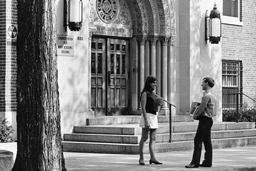 Students standing outside the entrance of Murphy Center, 1970s.