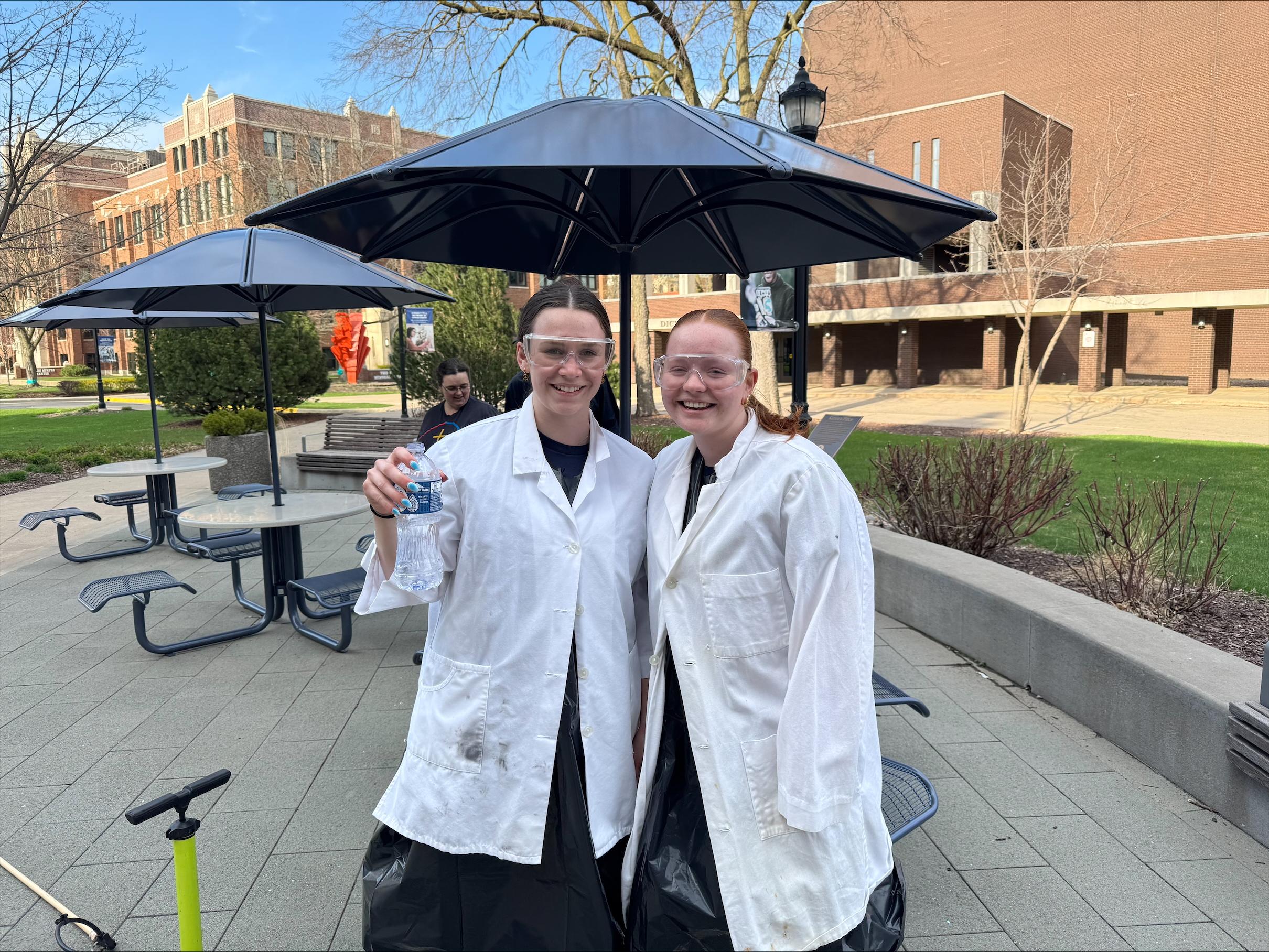 Lilly Aleckson, Biochemistry Major in lab coat
