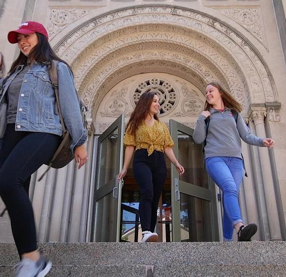 Students walking down stairs