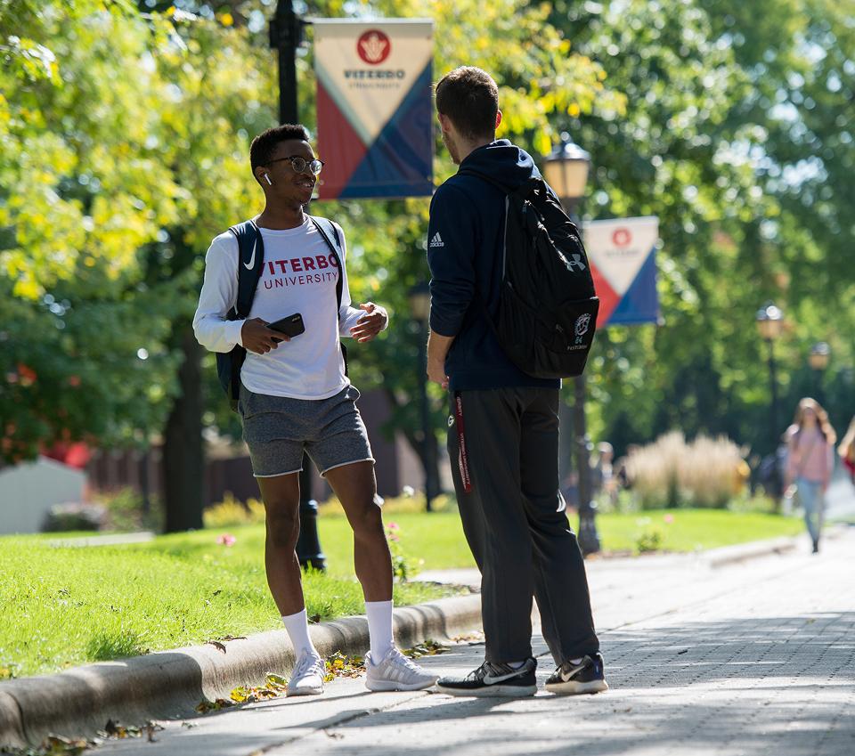 Students standing and talking