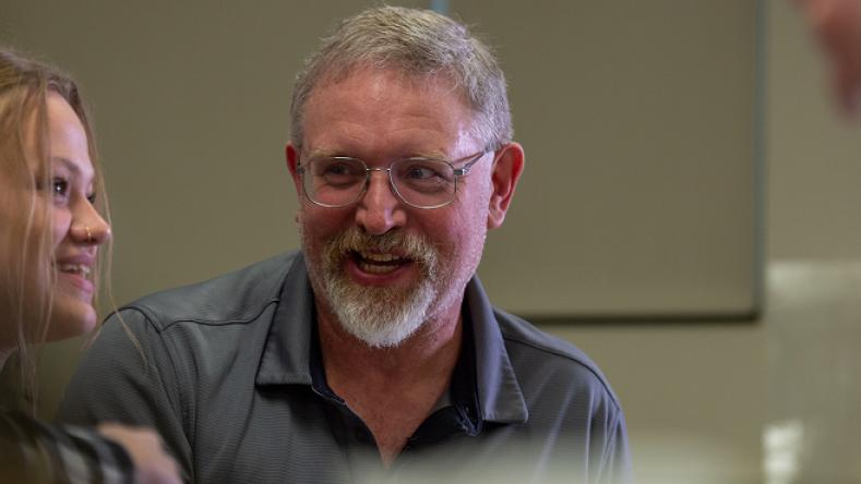 Professor talking to student