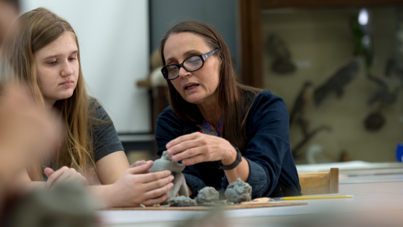 Student with art professor