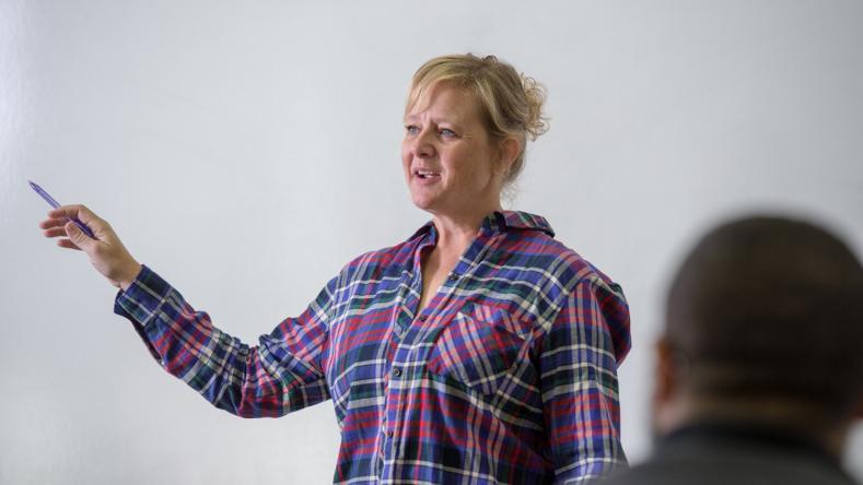 Social Work instructor talking to class