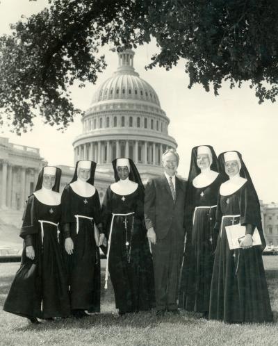 Mary Ann Gschwind, FSPA, far left, is pictured with other members of the Franciscan Sisters of Perpetual Adoration and a congressman in Washington, D.C.