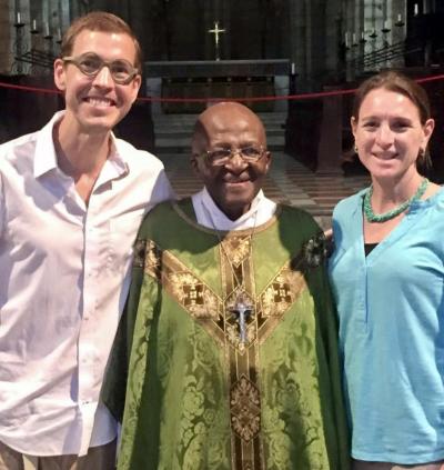 Brian and Kristen Konkol are pictured with the late Bishop Desmond Tutu