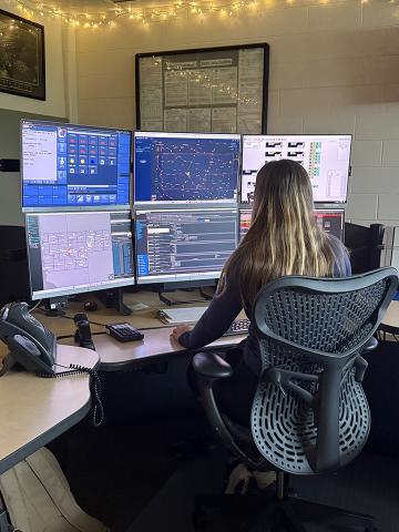 Ramseier working in the Dispatch Center