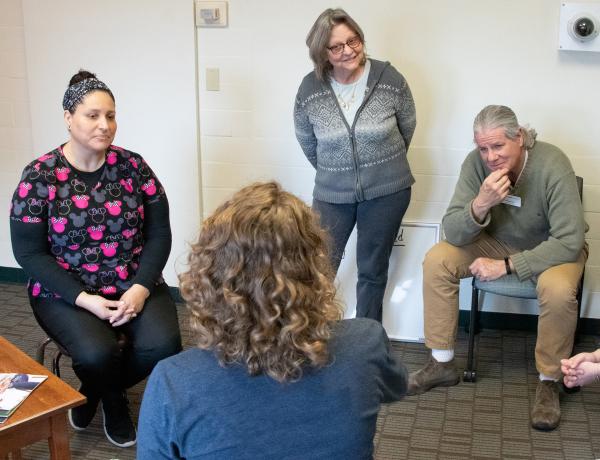 Deb Murray, center, director of Viterbo University’s Master of Science in Mental Health Counseling program, is leading the university’s VOICE initiative, working with a team that also includes faculty members Bill Bakalars, right, and Stephanie Thoreson-Olesen, and project manager Polly Scott.