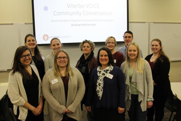 Members of the first cohort of graduate mental health counseling students taking part in the VOICE program are pictured at the first VOICE Community Conversation event.