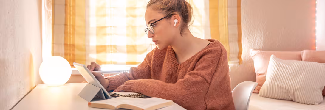 Student learning at home at desk