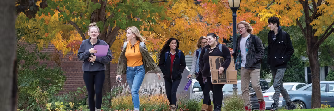 Students walking on campus during Fall